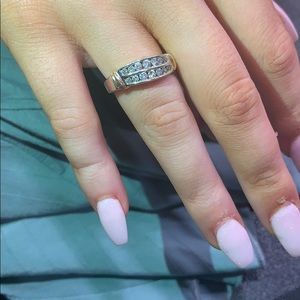 14 kt gold ring with 14 diamonds. only worn once.